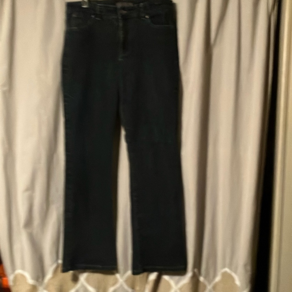 Women’s size 12 Nine West jeans. Excellent condition. Boot cut style.